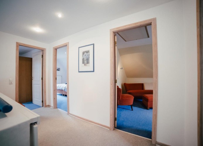 Hier geht's zu den Schlafzimmern